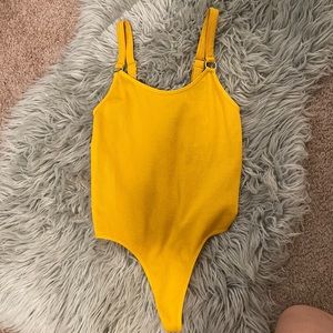 Orange/yellow body suit